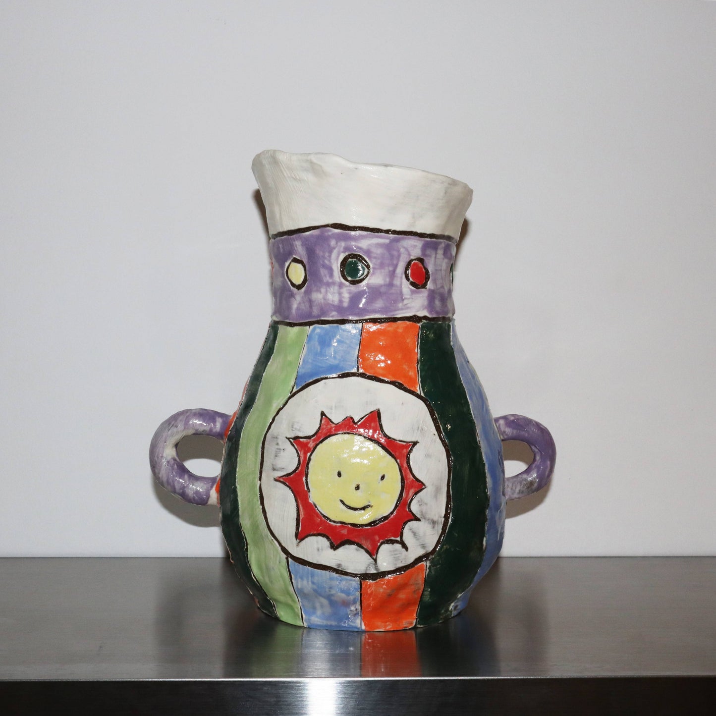 vase with sun and moon