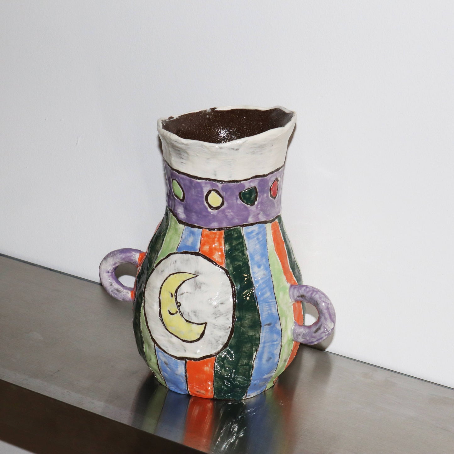 vase with sun and moon