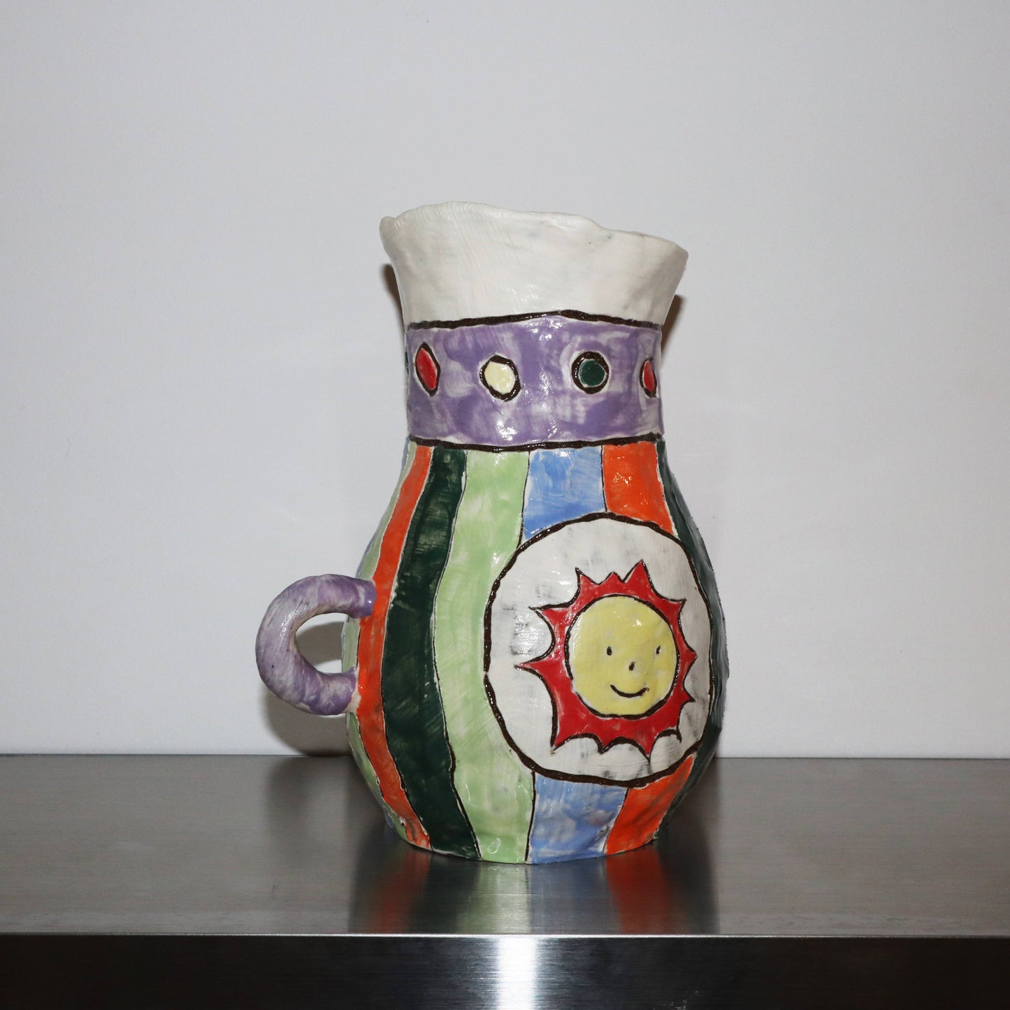 vase with sun and moon