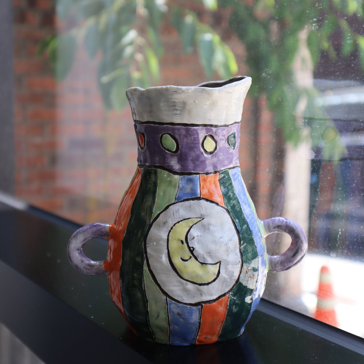 vase with sun and moon