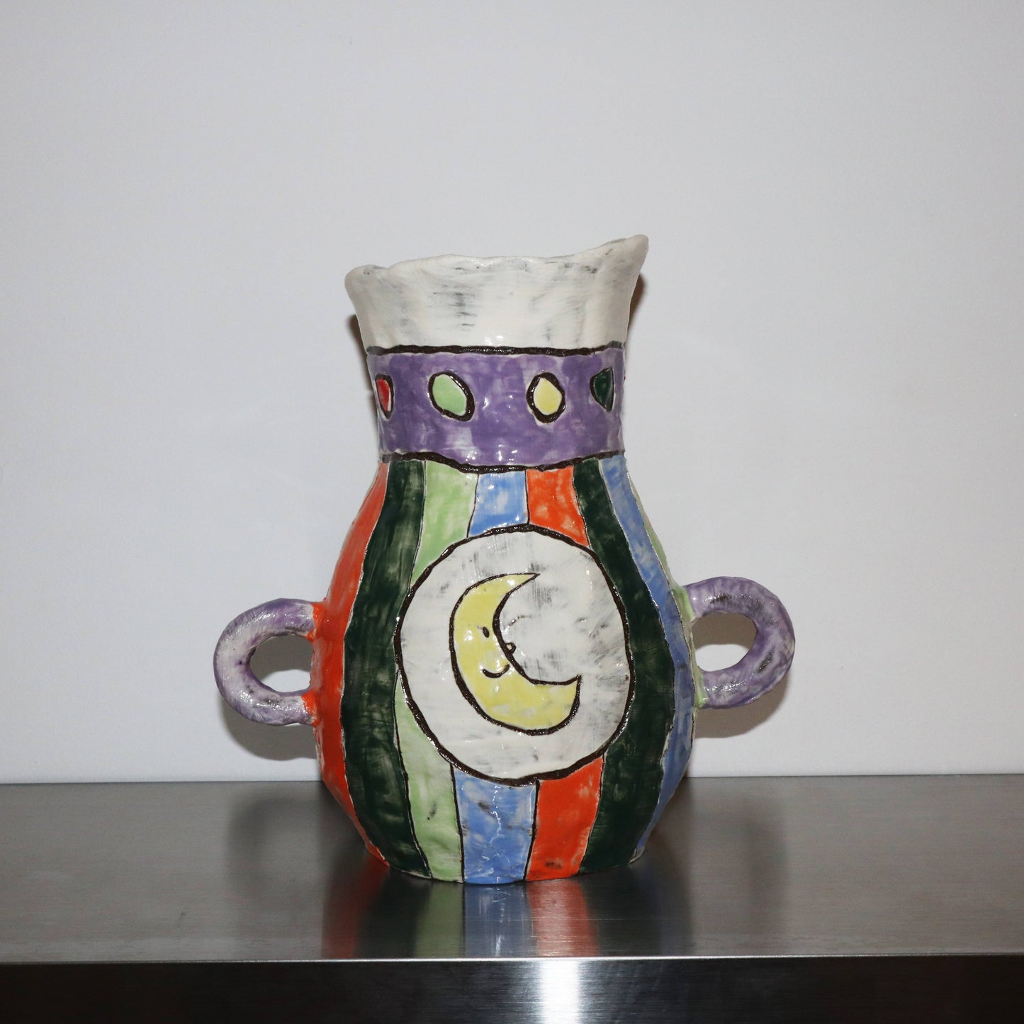 vase with sun and moon